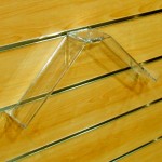 Obrotowa półka podwójna do butów z ogranicznikiem na panel frezowany shop wall PLEKSI