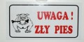 Tabliczka z napisami UWAGA ZŁY PIES