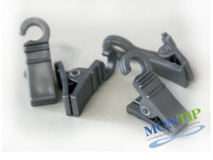 Plastic clip for curtain rail - changing room